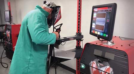 A man using a virtual welding machine
